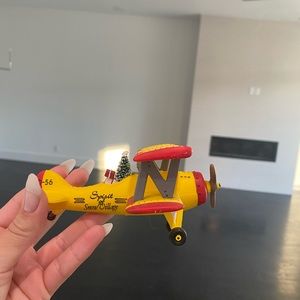 Department 56 yellow airplane